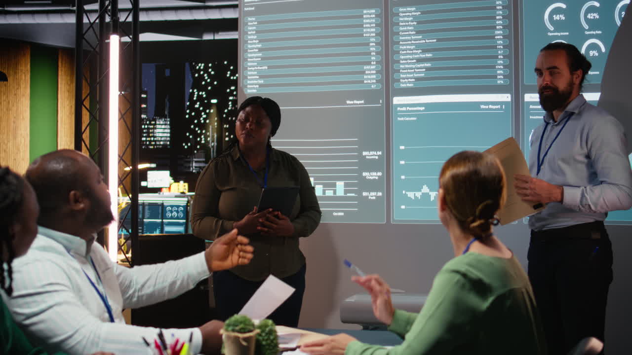 Business people examining organizational performance indicators