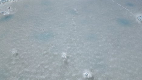 aerial reveal of vatnajokull glacier between mountains skaftafell national park