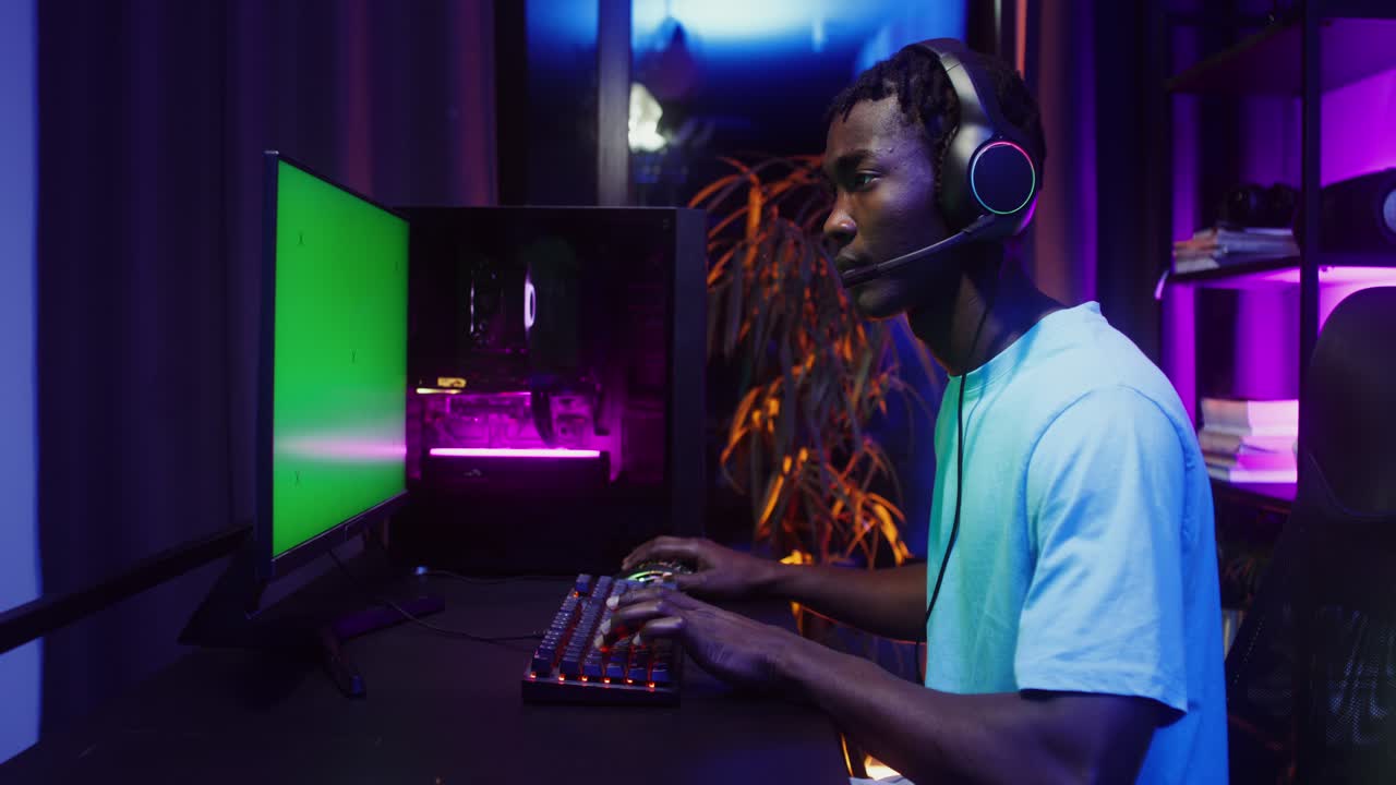 African American Gamer Streaming Online with a Gaming PC