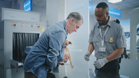 airport security screening of a pet dog