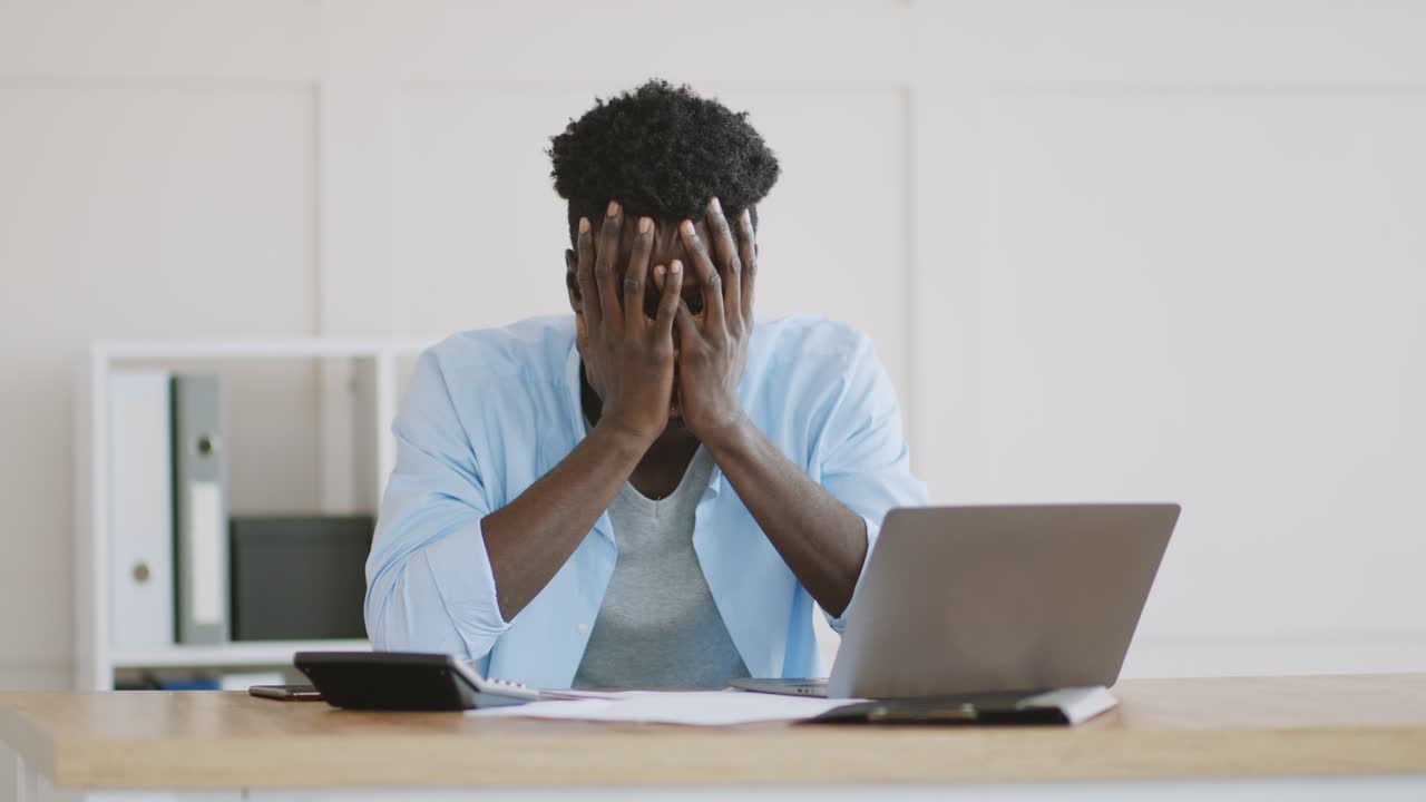Man working on paperwork and finances