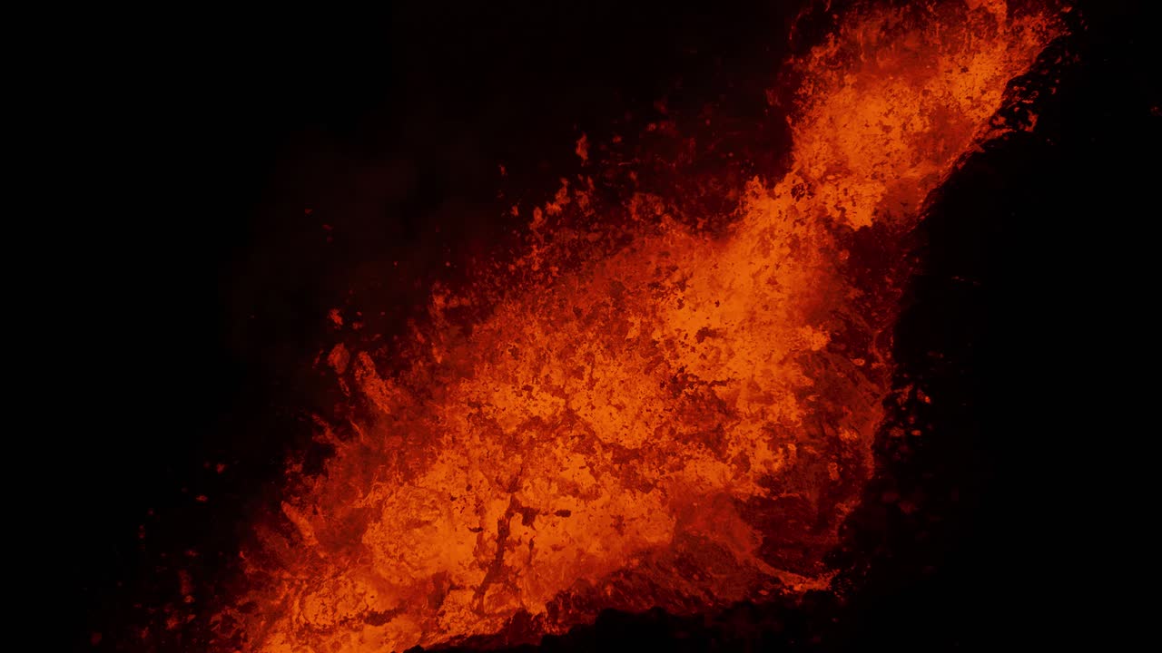 Close up shot of extremely hot lava bubbling at volcanic eruption in Iceland