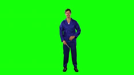 front view of mechanic with green screen