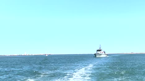 warship against the backdrop of the sky and beach in europe