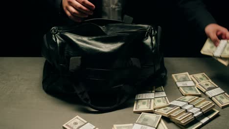 specialised police officer counting dollar banknotes in crime lab, conceptual image. high quality 4k footage