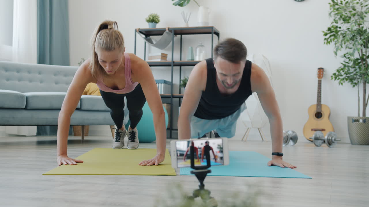 Couple Doing Push-Ups at Home