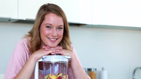 Pretty-woman-leaning-on-her-juicer