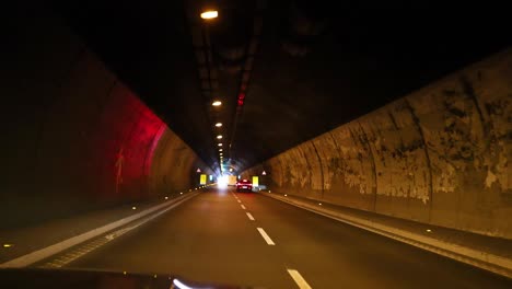 car journey through a tunnel in piedmont, italy