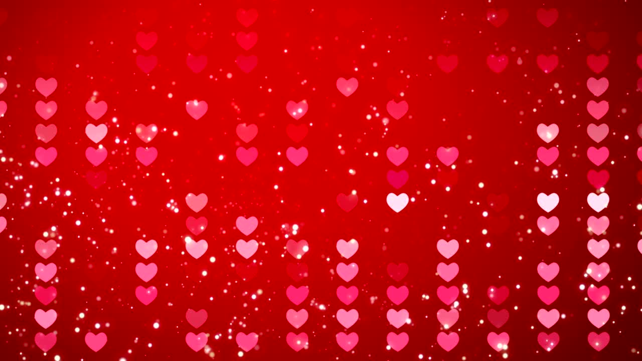 Texture di cuori rossi e coriandoli. Sfondo per San Valentino. Loop 4K