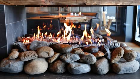 a fire place with rocks and firewood in it