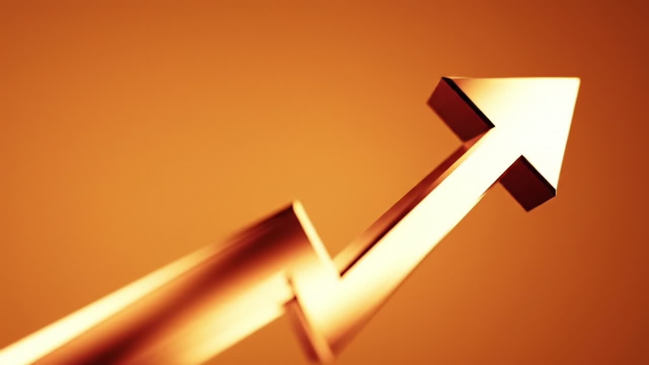An arrow points upwards against a bright orange background, symbolizing growth and direction. The glowing hue suggests evening time, creating an inspirational atmosphere.