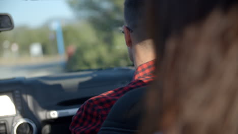 passengers on a road trip in a car, passenger point of view