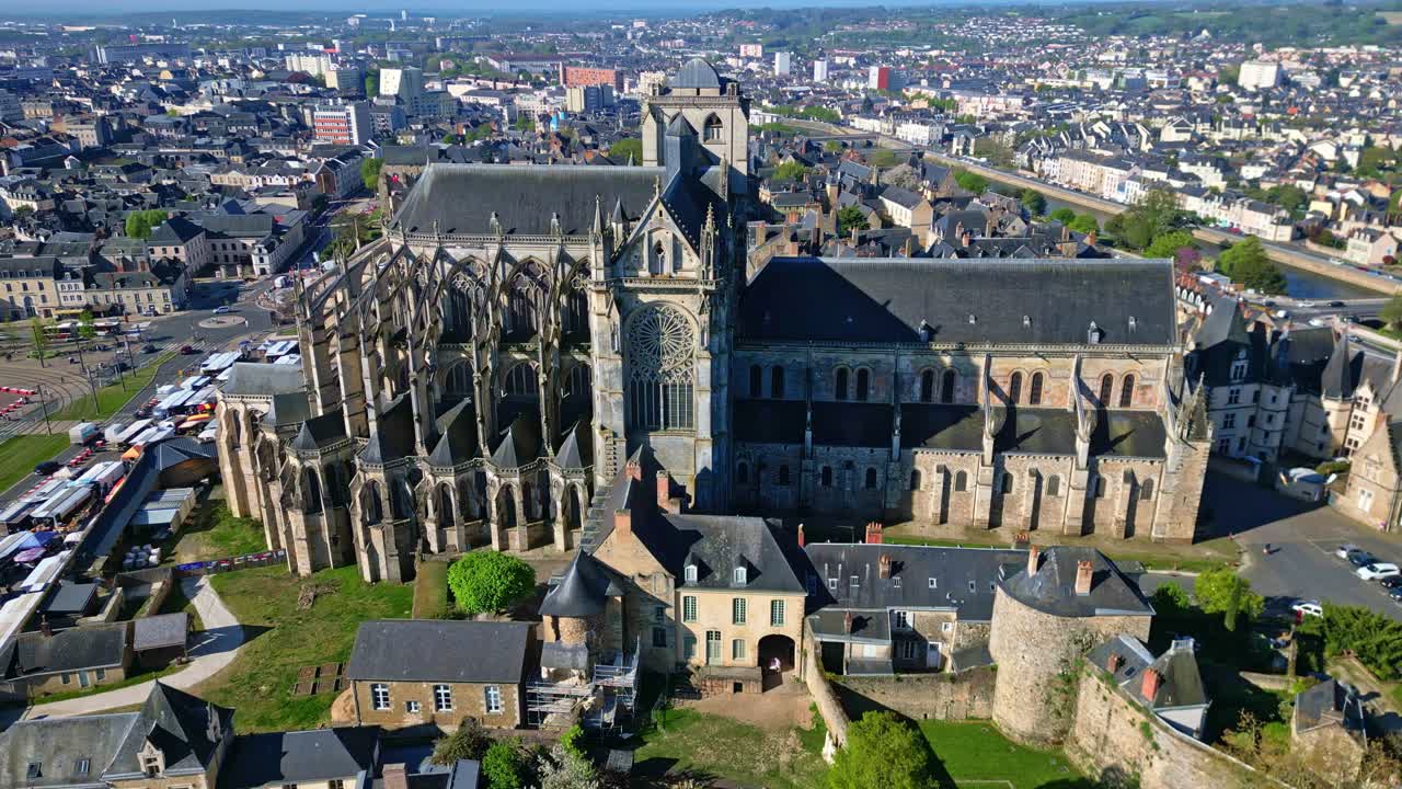 Historic city of Le Mans, with Cathedrale Saint-Julien, Marché des Jacobins, surrounding urban area, Sarthe in France. Aerial drone orbiting