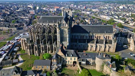 Historic city of Le Mans, with Cathedrale Saint-Julien, Marché des Jacobins, surrounding urban area, Sarthe in France. Aerial drone orbiting