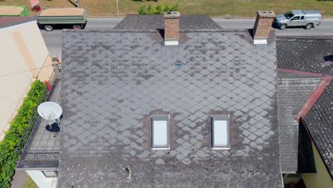 natural clay eternit roof of a house near the street