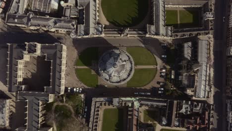 top down rising drone shot over bodleian library radcliffe camera dome oxford