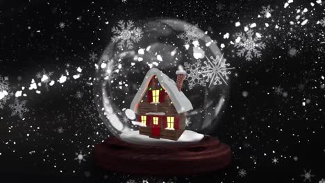 Animation-of-snow-globe-with-house-over-snow-and-star-on-dark-background