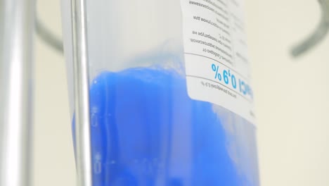 iv bag with blue solution