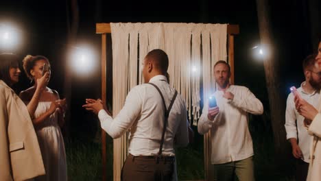 couple dancing at a night wedding reception