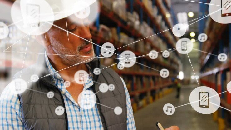 Animation of network of connections over man working in warehouse