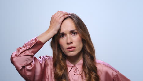 Stressed-businesswoman-having-problem-at-work.-Woman-touching-head-with-hand