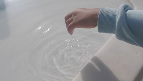 child playing in water