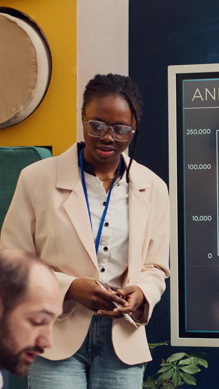 African American Businesswoman Giving Presentation in Modern Office