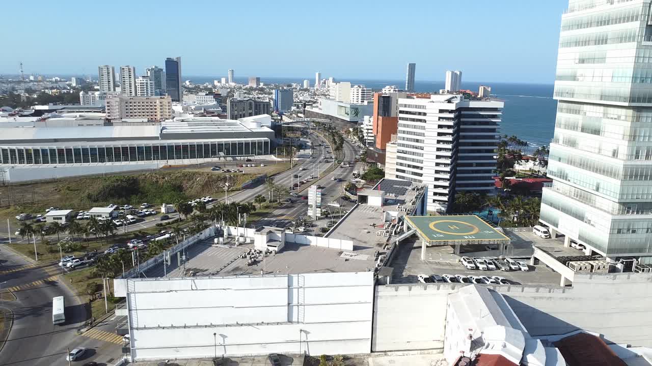Drone view of Boca del Río featuring Playa Mocambo and the vibrant area between Plaza Américas and Plaza Andamar under the afternoon sun