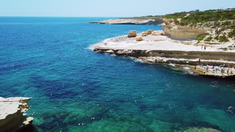 video from malta, st peter's pool on a sunny summer day