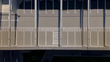 Aerial-shot-overhead-empty-spaces-at-the-Saint-Chamand-park-and-ride