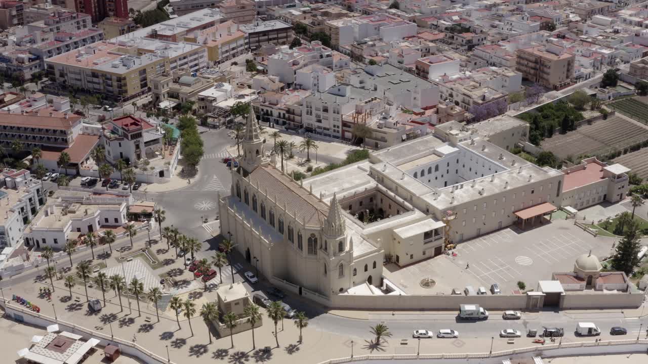 Aerial View of a Coastal Town in Spain with Church and Monastery