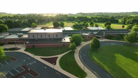 American-public-school-building-at-sunrise