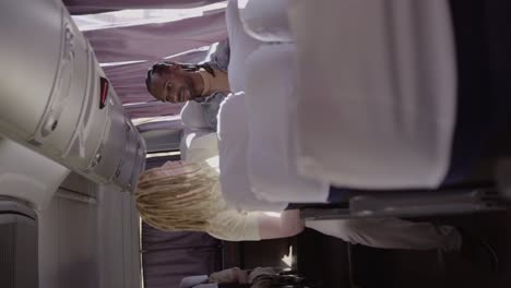 two men traveling inside a bus