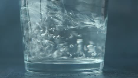 water being poured into a glass