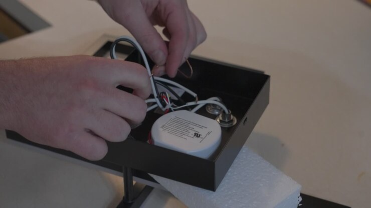 Freeing up the bound wires from transit position