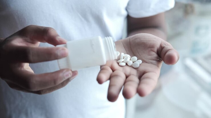 Person taking pills