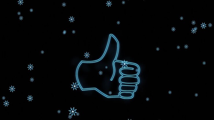 Animazione digitale di fiocchi di neve che cadono su simbolo al neon con icona di pollice in su su sfondo nero