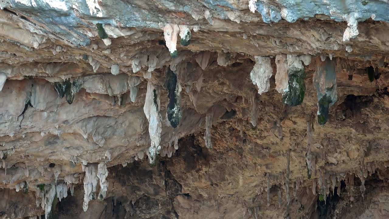 Stalactites Hanging From the Ceiling of a Limestone Cave