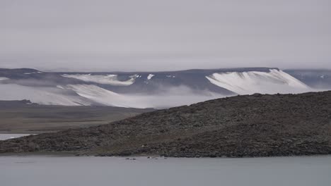 Norwegian-Islands-Above-Arctic-Circle,-Glaciers,-Ice-and-Mist-Above-Rocky-Land,-Wide-View