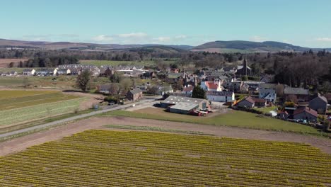 Aerial-view-of-the-Scottish-town-of-Fettercairn-on-a-sunny-spring-day,-Aberdeenshire,-Scotland