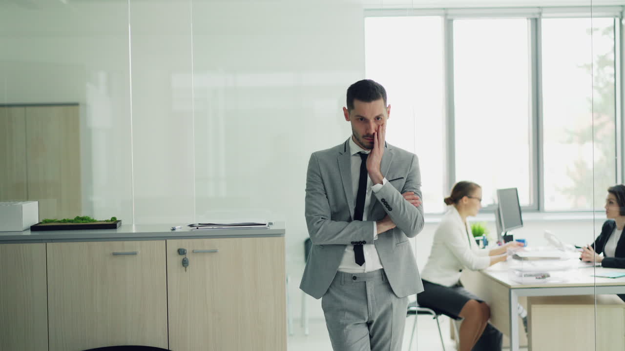Stressed Businessman in Modern Office