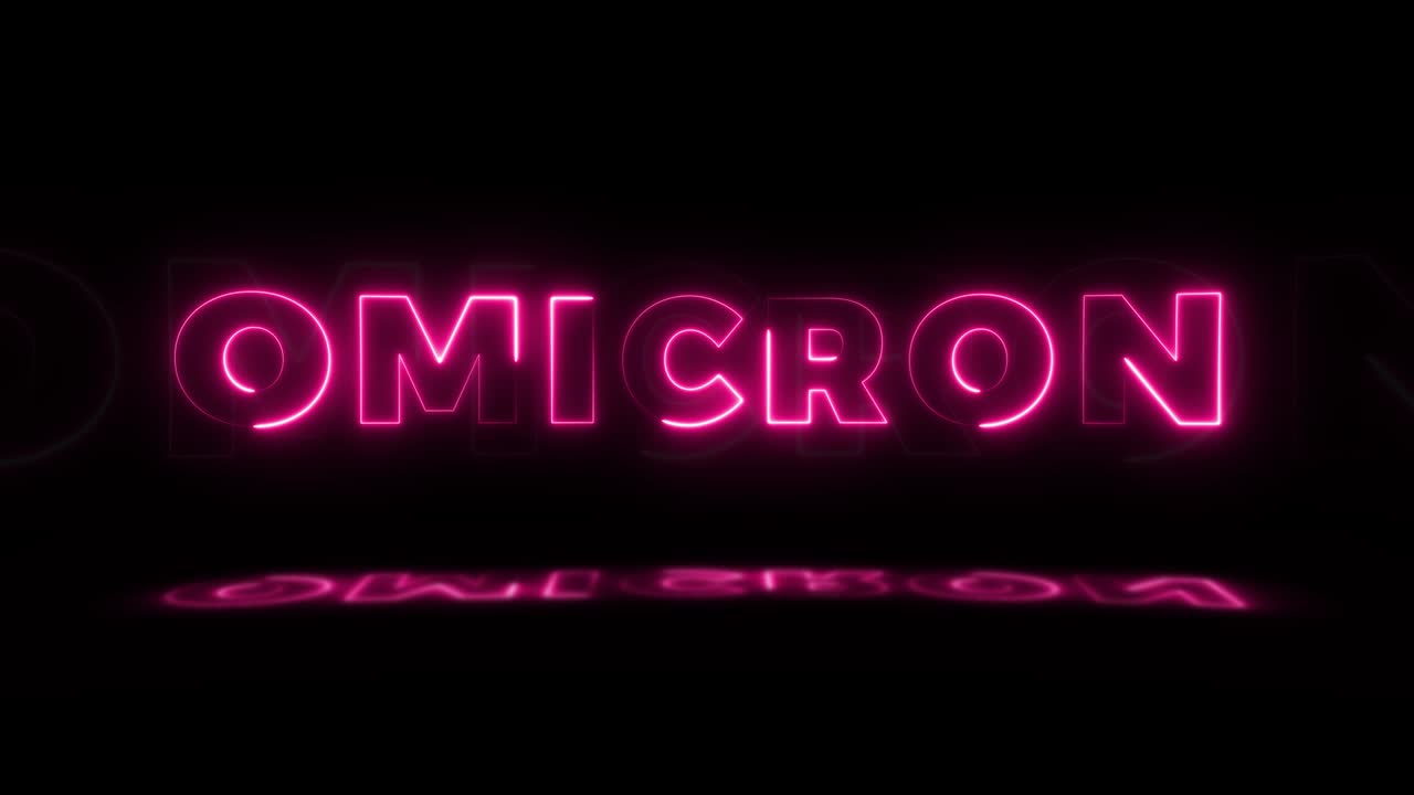 la palabra "omicron" brilla en neón sobre un fondo negro con reflejos en el suelo. letreros de brillo de neón en gráfico de movimiento de bucle sin costuras