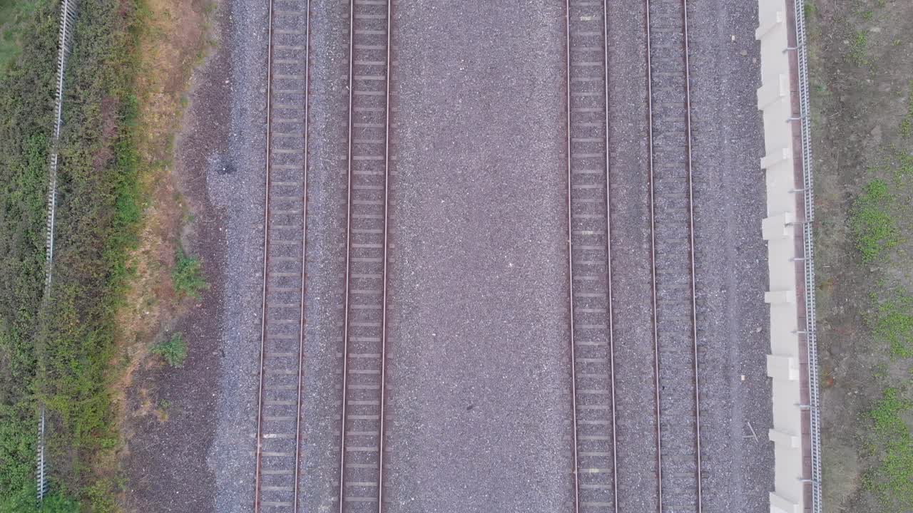Cargo train passing at tracks of Dublin Ireland aerial