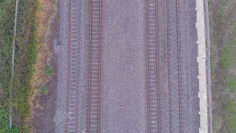 cargo train passing at tracks of dublin ireland aerial
