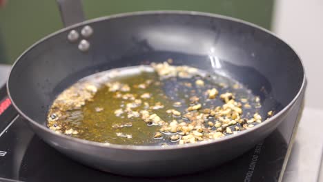 cooking garlic in a pan