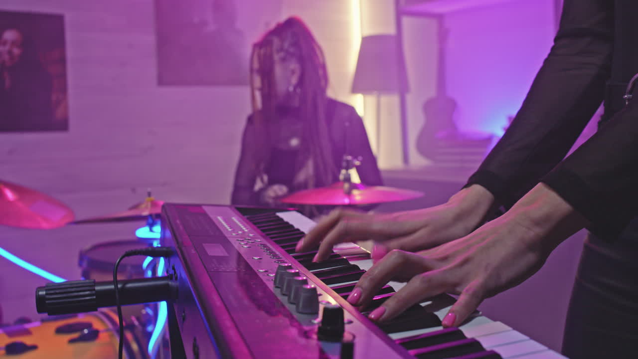 Pianist Hands Playing Keyboard Synth At Rock Concert