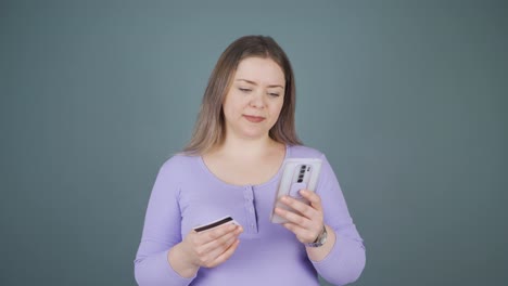 Young-woman-shopping-with-credit-card.