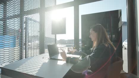 car service manager working at desk in office