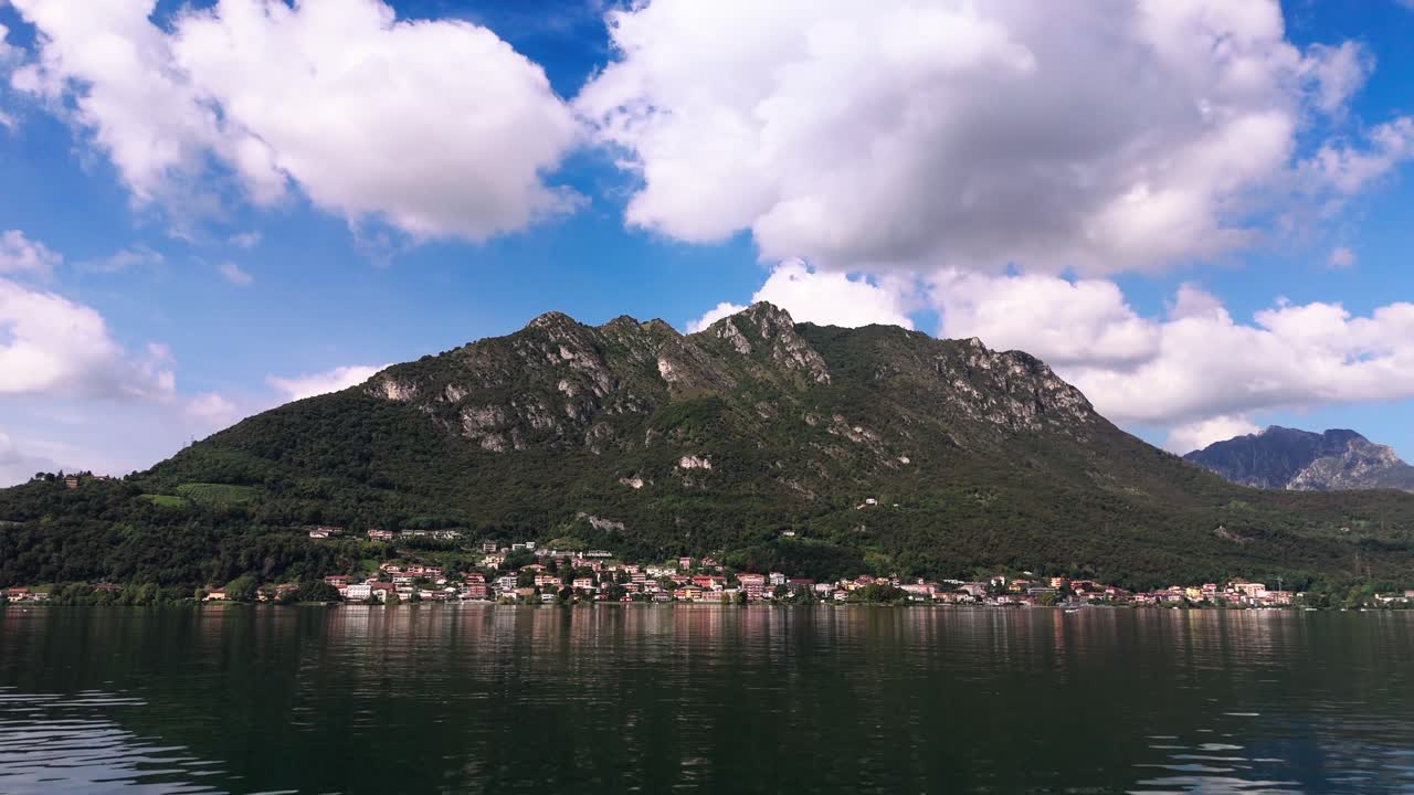 Fly close to water over Lake Garlate, Italy