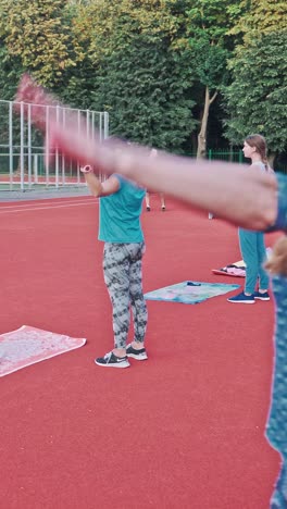 teamwork of group of women doing exercise